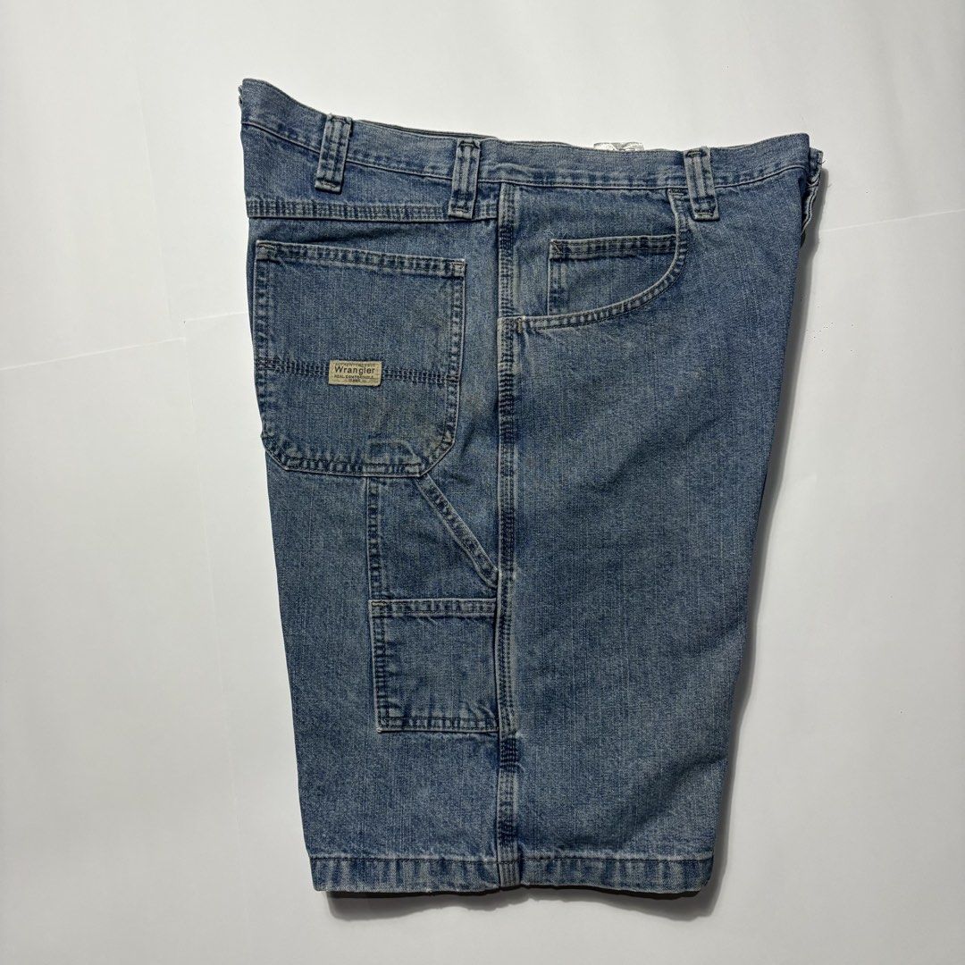 Wrangler Denim Carpenter Shorts Medium Wash (Category: Shorts) located in San Fernando. Submitted by lumang_gamit (Listing ID 1470397470, Image 3). Description: - Brand: Wrangler - Style: Denim carpenter shorts with utility pockets and hammer loop - Wash: Classic medium blue - Fit: Relaxed fit through the leg - Details: Heavy-duty stitching, standard button closure, and belt loops - Vibe: Ideal for summer, skating, or daily workwear - Condition: 