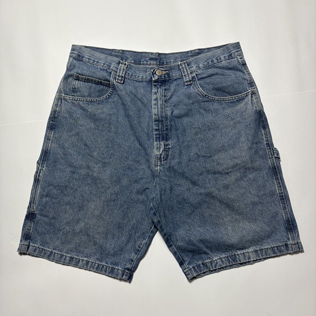 Wrangler Denim Carpenter Shorts Medium Wash (Category: Shorts) located in San Fernando. Submitted by lumang_gamit (Listing ID 1470397470, Image 1). Description: - Brand: Wrangler - Style: Denim carpenter shorts with utility pockets and hammer loop - Wash: Classic medium blue - Fit: Relaxed fit through the leg - Details: Heavy-duty stitching, standard button closure, and belt loops - Vibe: Ideal for summer, skating, or daily workwear - Condition: 