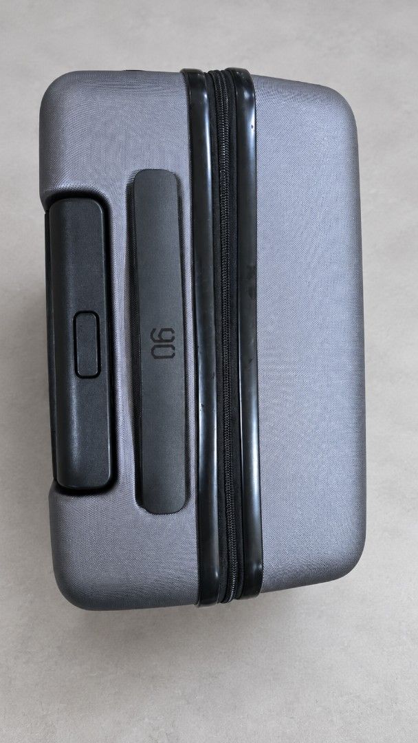 Xiaomi luggage with TSA Lock (Category: Luggage) located in Mandaluyong City. Submitted by jbird311 (Listing ID 1470453959, Image 3). Description: - Brand: Xiaomi - Color: Grey - Type: Hardside luggage with durable outer shell - Mobility: Smooth-rolling four double wheels - Security: Integrated TSA002 combination lock - Convenience: Top and side carry handles - Closure: Secure zip closure with branded dual zipper pulls - Design: Minimal vertical 