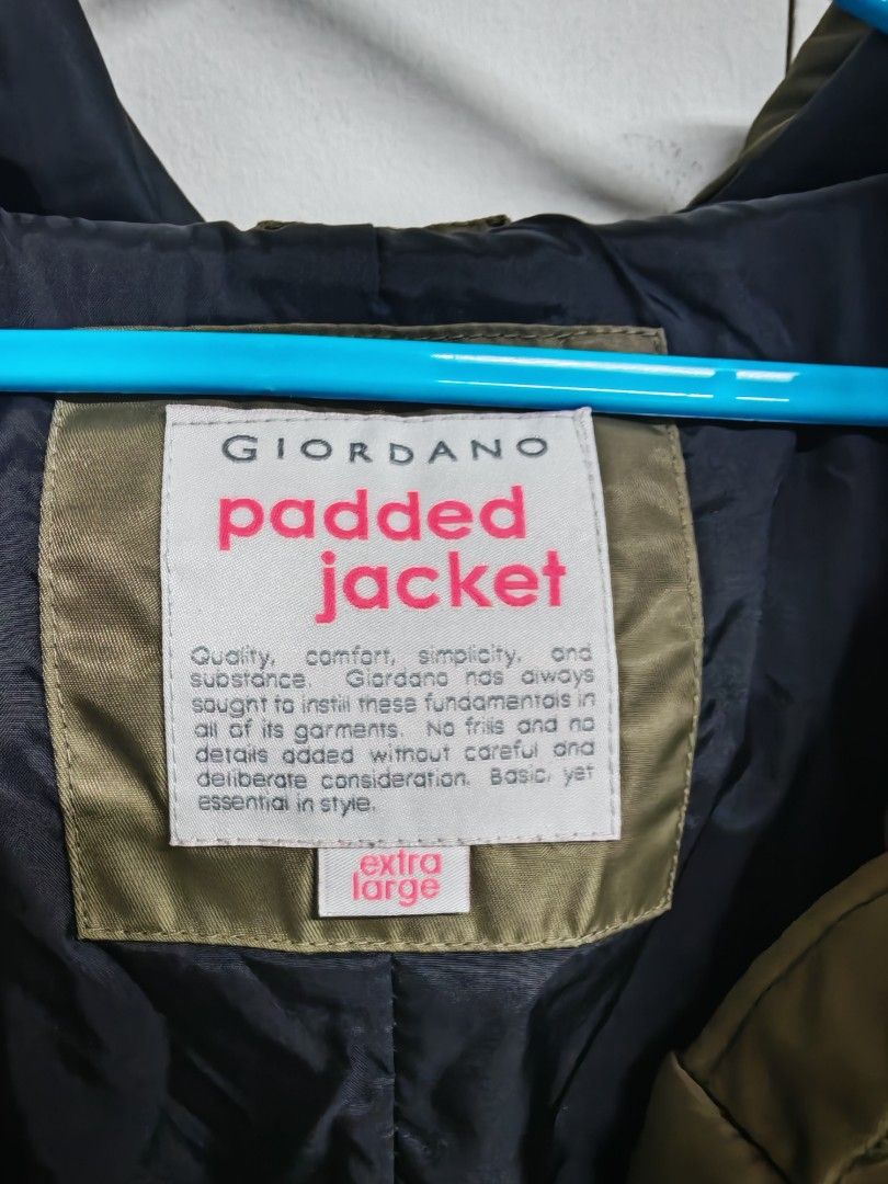 XL Giordano Padded Jacket Extra Large Green (Category: Coats, Jackets and Outerwear) located in Pasig City. Submitted by she_declutters_ph (Listing ID 1470391367, Image 2). Description: Pre-loved. Honest issue: Some discoloration near pockets, see images for reference. Brand: Giordano - Color: Olive Green with black inner contrast - Size: XL (Tag: 170/96A) - Material: 100% nylon shell & lining, warm polyester padding - Design: Quilted diamond pat