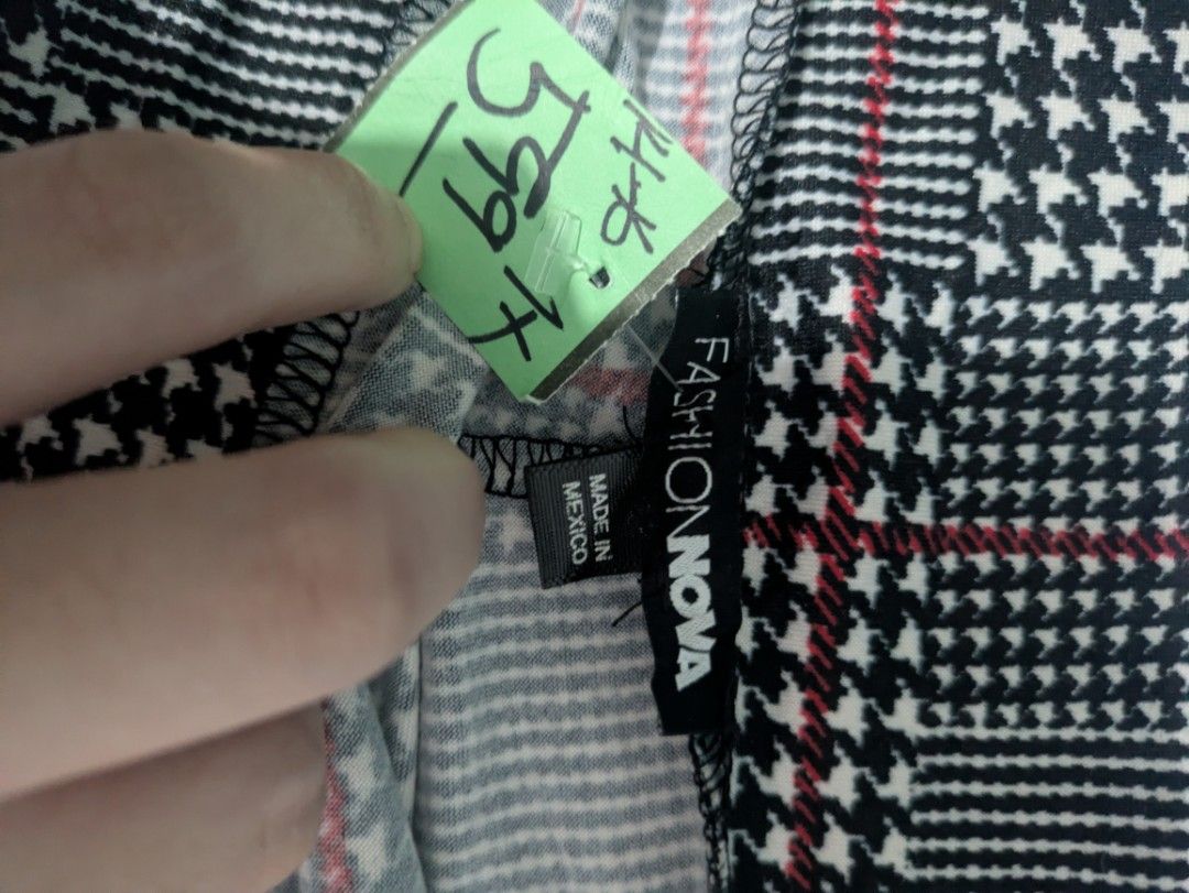 Y2K 2000s Fashion Nova Plaid Houndstooth Patchwork Mini Skirt (Category: Skirts) located in Bocaue. Submitted by _agentorange (Listing ID 1470504478, Image 2). Description: - Style: Short plaid skirt with houndstooth and windowpane patchwork patterns - Colorway: Black, white, and red - Fit: Fitted waistband with a clean flat front design - Pairing: Perfect to style with sweaters and boots for cooler weather fits 30-32 waistline no inner shorts an