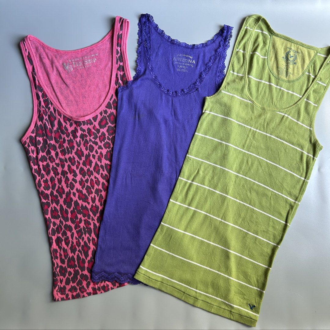 y2k tanktops- VS/Arizona/American Eagle| aspack (Category: Others Tops) located in Liloan. Submitted by fairymary.ph (Listing ID 1470458874, Image 3). Description: READ BIO BEFORE BUYING✨ take 3 tanktops for layering P200+sf (no more haggling please) all sizes are MEDIUM on tag brands: victoria’s secret- leopard print pink (no issue) american eagle- green with logo (no issue) arizona- violet lace (with tear).