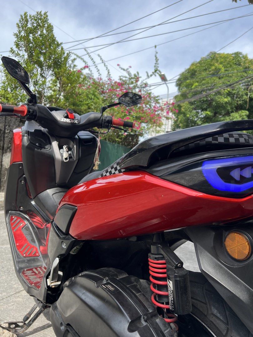 Yamaha NMAX V2 (Category: Motorbikes for Sale) located in Pasay City. Submitted by bryanmangaliag05 (Listing ID 1470365258, Image 3). Description: NMAX V2 2021 NON ABS Price: 85K NALANG‼️ Original OR CR Open Dos Registered 2027 May plaka from LTO 35K odo Color indicated Led tail light Saiyan series shock Makinis fairings Walang center stand pero may kabitan pa. Location: Pasay city leveriza Pickup Only.