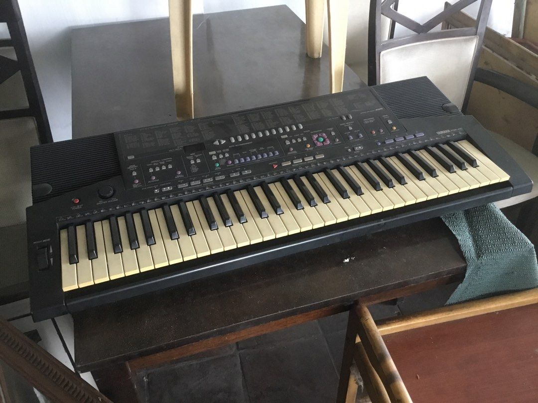 Yamaha PSR-410 Electronic Keyboard (Category: Musical Instruments) located in Manila. Submitted by roberto.enriquez (Listing ID 1470556635, Image 1). Description: - Model: Yamaha PSR-410 Portable Keyboard (Black) - Condition: Good working condition with minor yellowing on keys due to age - Features: Built-in voices, auto accompaniment, registration memory, and pitch bend wheel - Audio: Built-in stereo speakers - Power: Standard power adapter incl