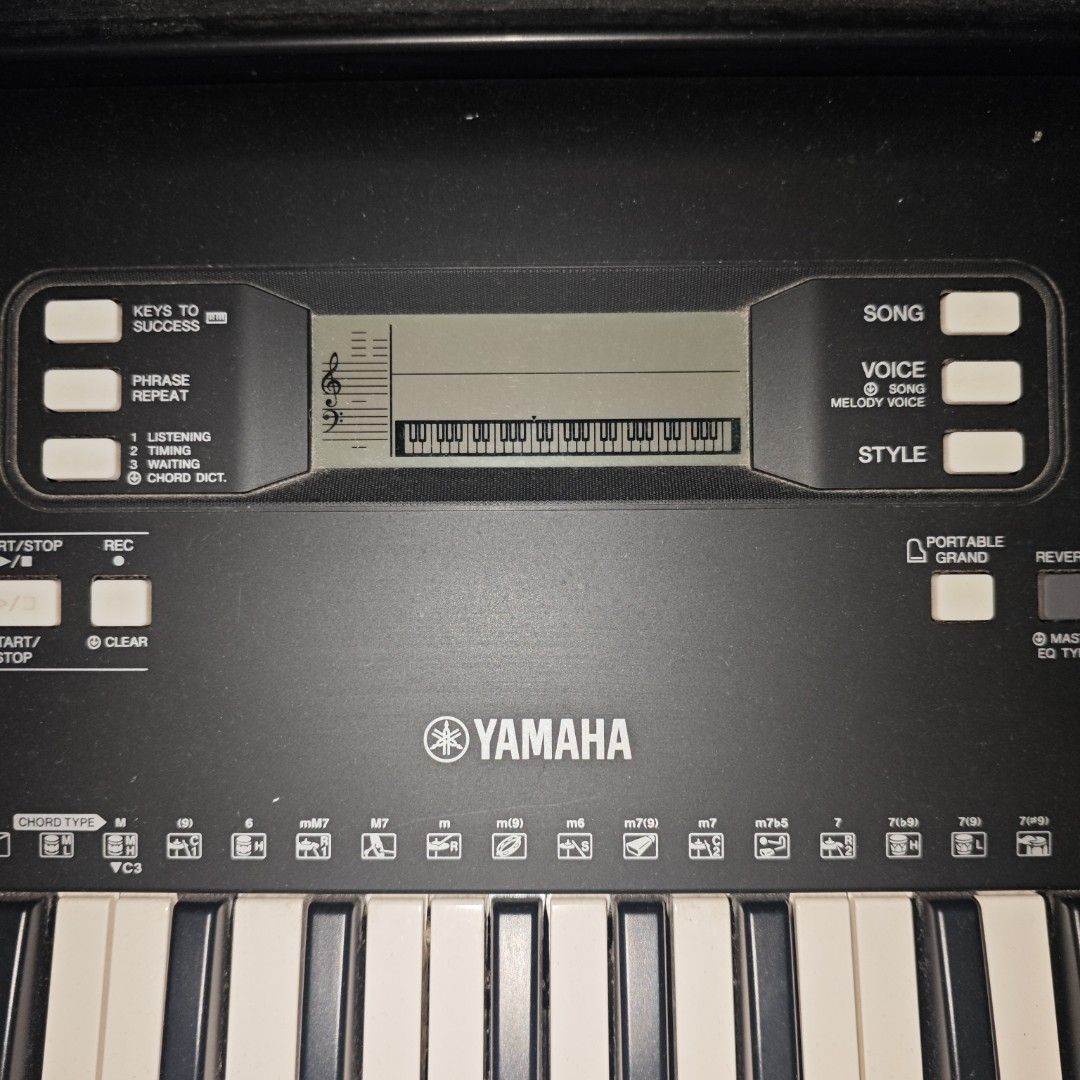 Yamaha PSR-E363 Portable Electronic Keyboard with Stand (Category: Musical Instruments) located in Iloilo. Submitted by teezeewhyyy (Listing ID 1470444904, Image 3). Description: - Complete set: Yamaha digital keyboard with sturdy adjustable double-X metal stand and music rest included - Clear display: Center LCD screen shows staff notation and note positions in real-time - Great sound: Built-in speakers located on the upper left and right sides 