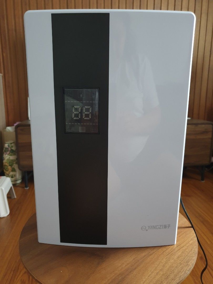 YANGZI Dehumidifier with remote (Category: Air Purifiers & Dehumidifiers) located in Tagaytay City. Submitted by ladyprinceww1984 (Listing ID 1470422926, Image 1). Description: YANGZI Dehumidifier with remote Digital front screen showing real-time humidity levels 2.2L Water tank capacity with extra tank available and hose for continous drainage Good for bathrooms and small rooms RFS: Bought a bigger one .