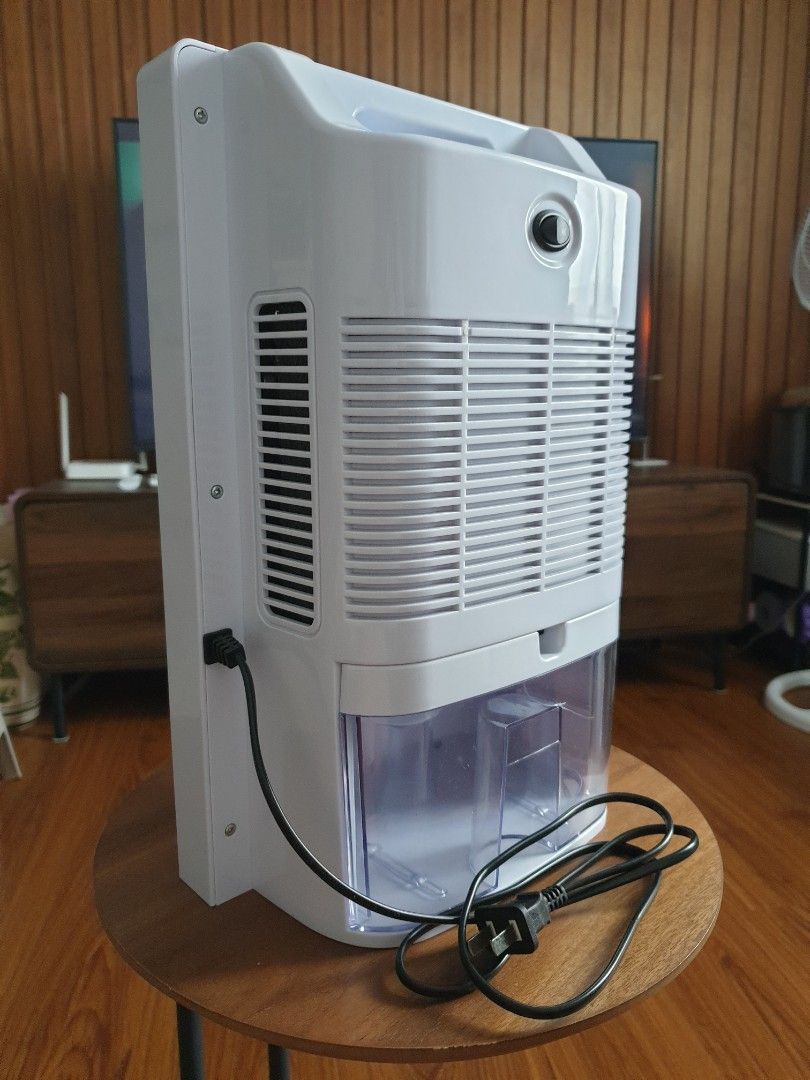 YANGZI Dehumidifier with remote (Category: Air Purifiers & Dehumidifiers) located in Tagaytay City. Submitted by ladyprinceww1984 (Listing ID 1470422926, Image 2). Description: YANGZI Dehumidifier with remote Digital front screen showing real-time humidity levels 2.2L Water tank capacity with extra tank available and hose for continous drainage Good for bathrooms and small rooms RFS: Bought a bigger one .