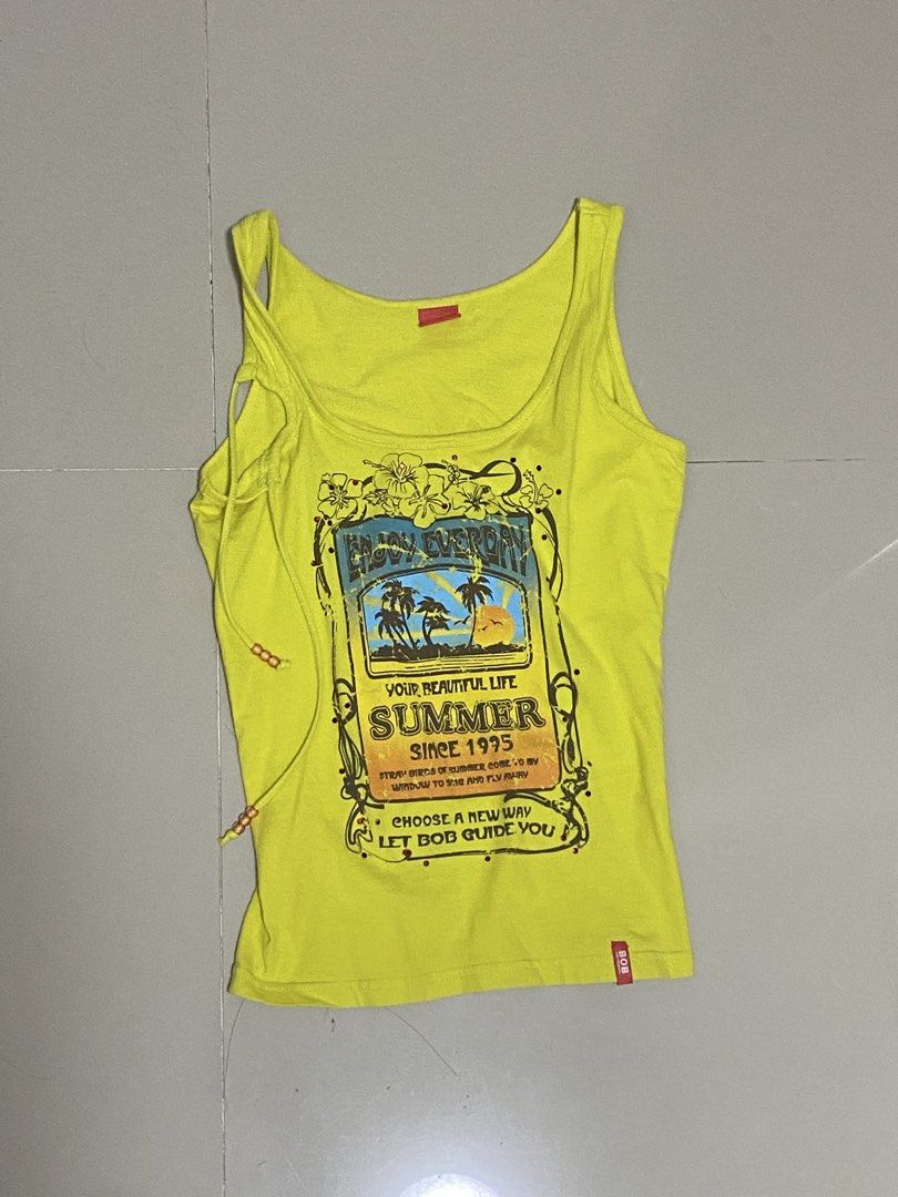 yellow 2000s summer graphic tank top (Category: Sleeveless) located in Manila. Submitted by swanlike (Listing ID 1470489098, Image 3). Description: 13 x 21 ₱250 + SF MOP: Gcash.