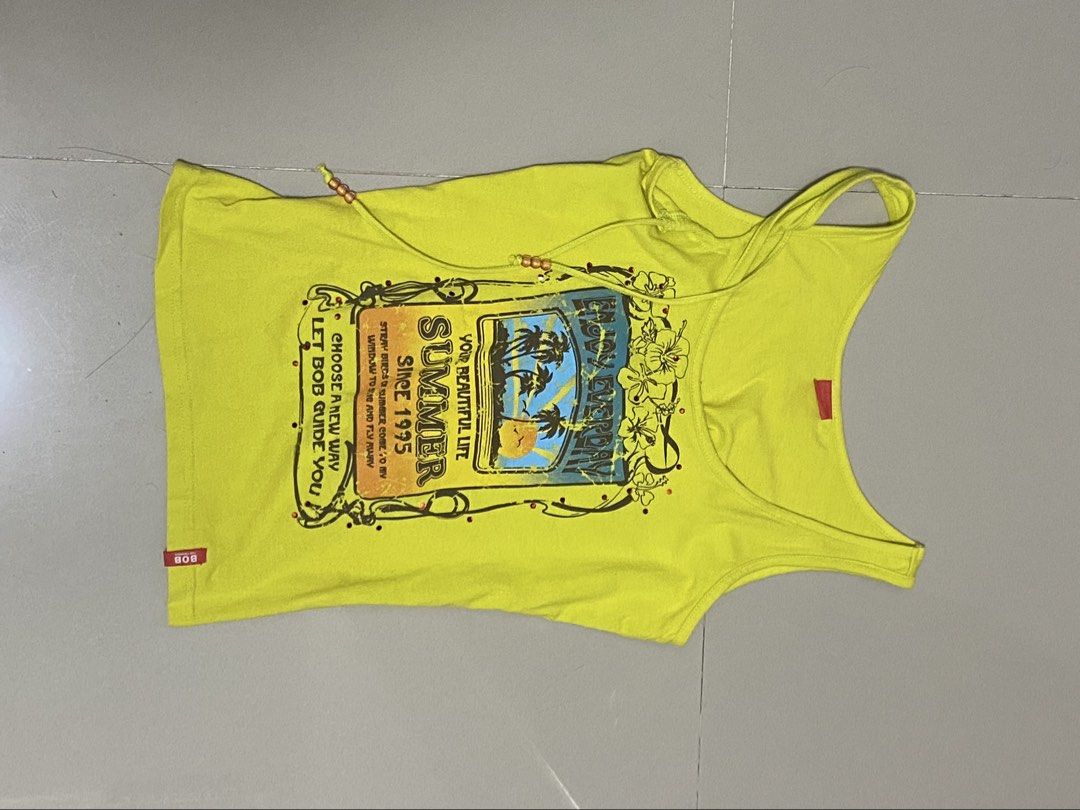 yellow 2000s summer graphic tank top (Category: Sleeveless) located in Manila. Submitted by swanlike (Listing ID 1470489098, Image 2). Description: 13 x 21 ₱250 + SF MOP: Gcash.