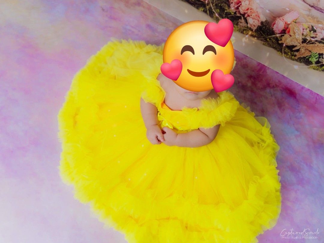 Yellow Princess Gown (Category: Babies & Kids Fashion) located in Santa Rosa. Submitted by sugarhiccupppp1 (Listing ID 1470444206, Image 1). Description: - Color: Bright yellow - Design: Off-shoulder ruffled neckline with a cute bow accent at the bodice - Skirt: Super puffy, fluffy tiered tulle with pearl details throughout - Condition: Excellent, worn only once for a studio photoshoot and thoroughly cleaned - Perfect for: Birthday parties, pagea