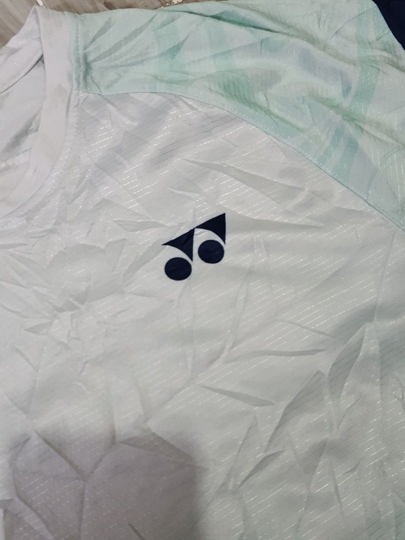 YONEX SPORTS TSHIRT (freeshipping) (Category: Activewear) located in Quezon City. Submitted by gyl-stop (Listing ID 1470442668, Image 2). Description: free shipping 21 x 27.5 excellent condi cr: 9.8/10 issue: none.