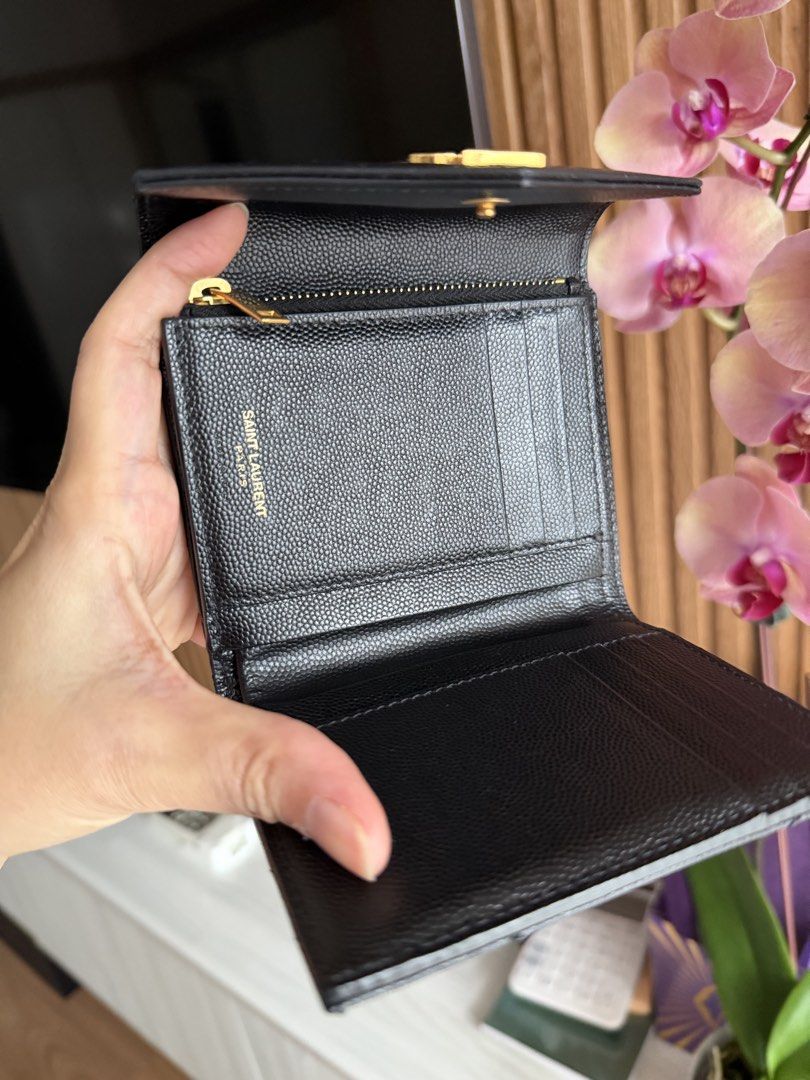 YSL WALLET- Trifold (Category: Wallets & Card holders) located in Makati City. Submitted by lambogirl (Listing ID 1470416654, Image 3). Description: ✔️In excellent condition- minimal signs of used ✔️Free shipping or pick up (Makati) ✔️comes with dust bag, and entrupy (authenticity card).