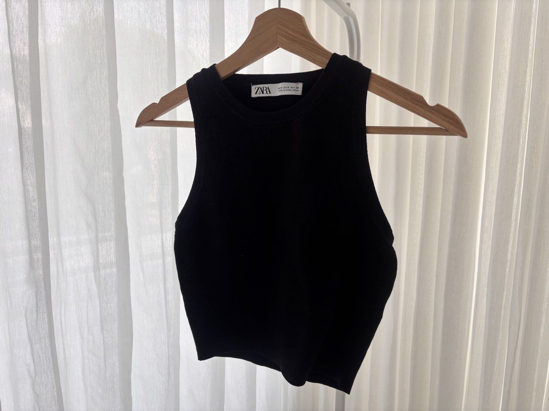 ZARA basic black ribbed tank top (Category: Sleeveless) located in Manila. Submitted by gothclaudia (Listing ID 1470422314, Image 1). Description: - size S - classic round neckline, sleeveless - ribbed fabric design - fits super nicely on torso!.