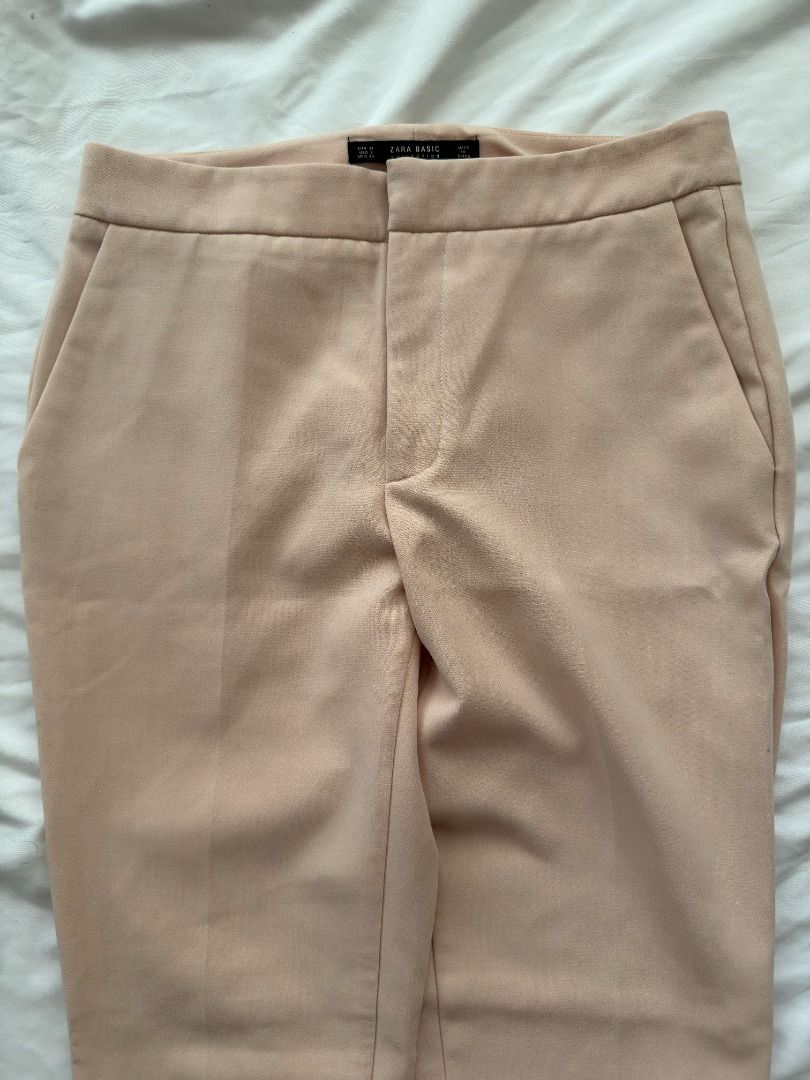 Zara Basic Collection Peach Pink Trousers Pants EUR 34 (Category: Jeans) located in Cebu City. Submitted by _t.rix (Listing ID 1470375773, Image 3). Description: - Brand: Zara Basic Collection - Size: EUR 34 / US 2 / MEX 24 (Fits true to size) - Color: Peach pink - Style: Tailored with clean waistband and back welt pockets - Fabric: Smooth finish - Versatility: Perfect for work or casual days.