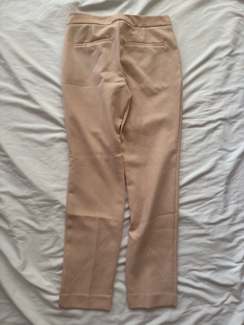 Zara Basic Collection Peach Pink Trousers Pants EUR 34 (Category: Jeans) located in Cebu City. Submitted by _t.rix (Listing ID 1470375773, Image 1). Description: - Brand: Zara Basic Collection - Size: EUR 34 / US 2 / MEX 24 (Fits true to size) - Color: Peach pink - Style: Tailored with clean waistband and back welt pockets - Fabric: Smooth finish - Versatility: Perfect for work or casual days.
