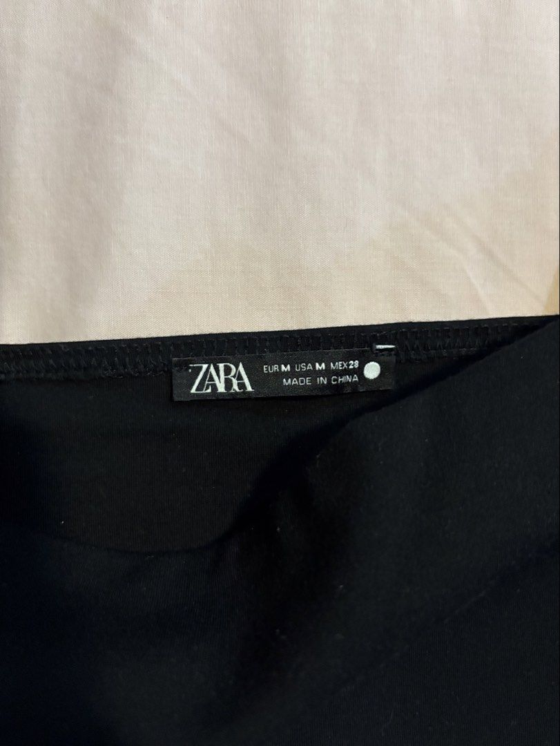 Zara Black Square Neck Crop Top (Category: Sleeveless) located in Quezon City. Submitted by cmtom (Listing ID 1470368941, Image 3). Description: Loc: qc black crop top from zara. Bought in 2021, used only a handful of times. Material is thick and slightly stretchy but really comfortable has some detergent stains (as seen in pic) but these are easily removable with handwashing otherwise great condition Best fits size M (maybe even L since it’s str