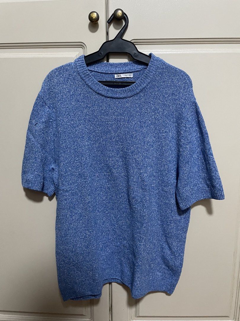 Zara blue knit shirt (Category: Tshirts & Polo Shirts ) located in Makati City. Submitted by crisbeooo (Listing ID 1470380866, Image 1). Description: Size M, relaxed fit (can fit size L) Used for a few times, no issues.