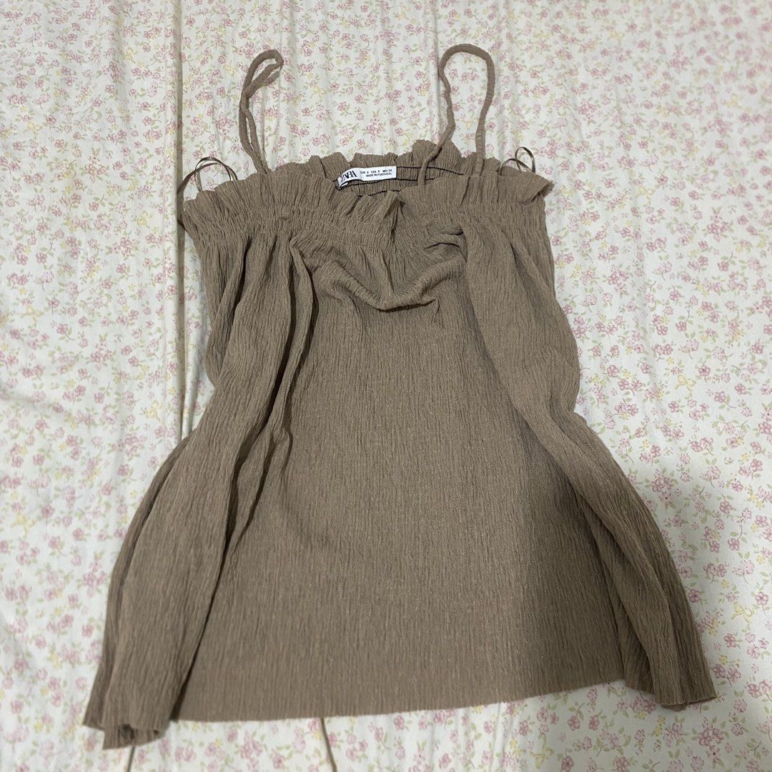 Zara Brown Ruffle Crinkle Camisole Top (Category: Sleeveless) located in Davao. Submitted by hercloset.dvo (Listing ID 1470475242, Image 1). Description: .
