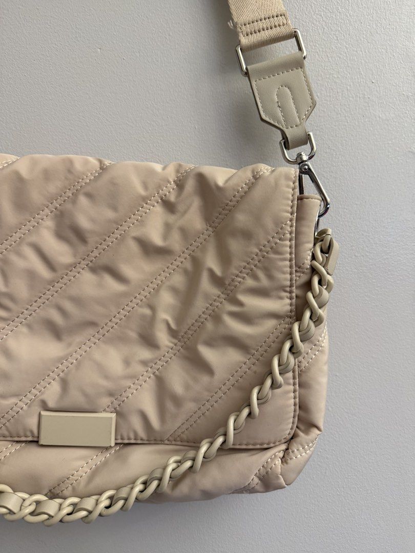 ZARA Cream Adjustable Cross body bag (Category: Cross-body Bags) located in Manila. Submitted by closetclearout.mnl (Listing ID 1470410825, Image 1). Description: defect: stain .