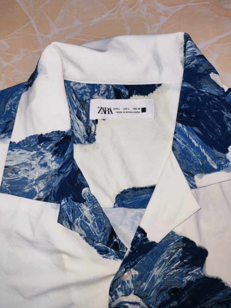ZARA floral polo (Category: Tshirts & Polo Shirts ) located in Cotabato. Submitted by rayhan.thriftee (Listing ID 1470349754, Image 2). Description: zara floral polo size XL frame good as.new no issue.