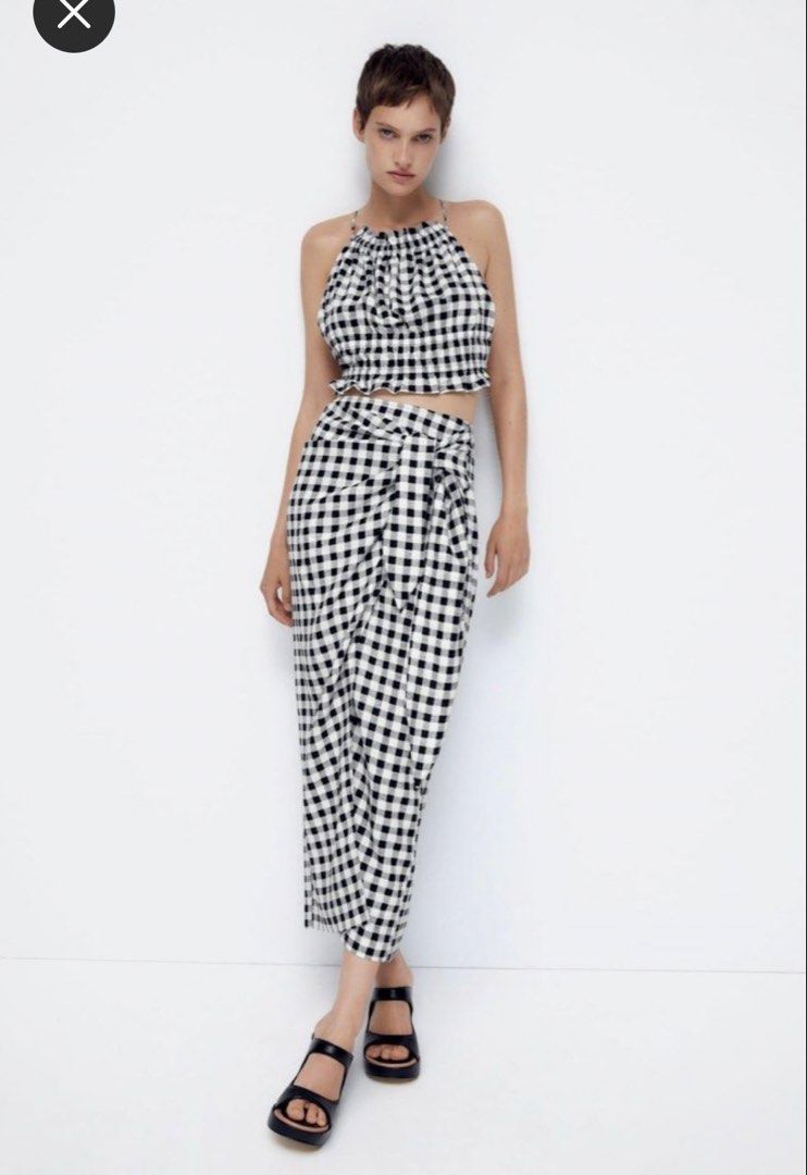 Zara Gingham Wrap Skirt (Category: Skirts) located in Taguig. Submitted by karlas.closet (Listing ID 1470509154, Image 1). Description: FOR SALE Zara Gingham Wrap Skirt - Brand new condition - Never worn - Size: Medium - Selling for only Php 650! - Express shipping / same-day delivery within Metro Manila via Lalamove or GrabExpress. - Nationwide shipping via J&T. - Buyer to cover Shipping Fee..