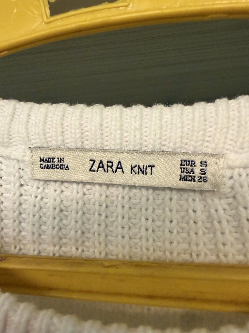 Zara Knit White Crop Sweater (Category: Longsleeves) located in Calamba. Submitted by xnikkidg (Listing ID 1470450944, Image 2). Description: - Brand: Zara - Item: White knit cropped sweater - Size: S (fits true to size) - Details: Round neckline, long sleeves, front textured pattern, ribbed trim at collar, cuffs, and hem - Material: Soft knit, made in Cambodia - Style tip: Easy to pair with high-waisted bottoms - Condition: Excellent / Like new.