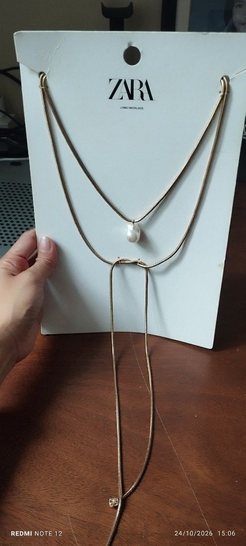 Zara Pearl Multi-strand Necklace (Category: Necklaces) located in Makati City. Submitted by larasdowry (Listing ID 1470553625, Image 3). Description: take all accessories. pearl necklace used once. Zara chord pearl necklace new. vintage clip earrings very nice. tried only. cultured pearl bracelet used. all for 1200.