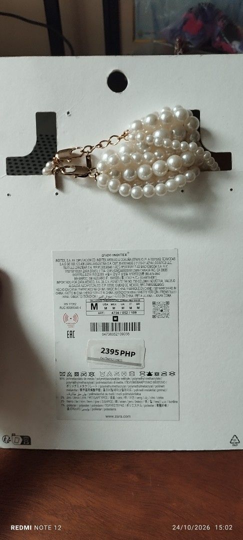 Zara Pearl Multi-strand Necklace (Category: Necklaces) located in Makati City. Submitted by larasdowry (Listing ID 1470553625, Image 2). Description: take all accessories. pearl necklace used once. Zara chord pearl necklace new. vintage clip earrings very nice. tried only. cultured pearl bracelet used. all for 1200.