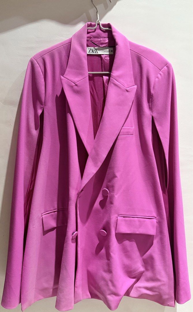 Zara Pink Cape Blazer Jacket Size XL (Category: Coats, Jackets and Outerwear) located in Manila. Submitted by beautymasters (Listing ID 1470494608, Image 1). Description: - Brand: Zara -Size: XL - Style: Double-breasted cape blazer with trendy slit sleeves - Color: Vibrant bright pink - Features: Structured lapels, front flap pockets, fully lined interior - Origin: Made in Morocco - Condition: Clean, modern statement piece.