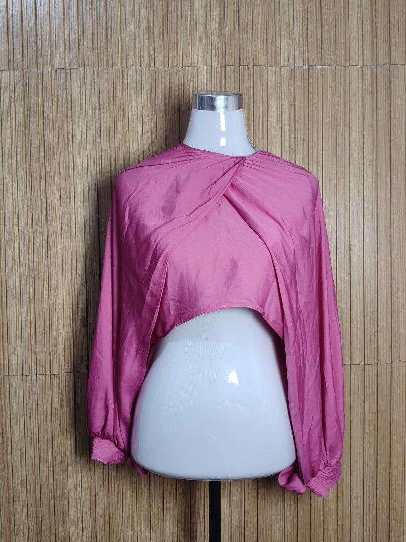 Zara Pink Cropped Blouse Top Size L (Category: Blouses) located in Taguig. Submitted by ashie_clothing (Listing ID 1470380137, Image 1). Description: - Brand: Zara - Size: Large (L) - Condition: Brand New with Tags (BNWT) - Color: Vibrant Pink - Details: Draped twisted front, long balloon sleeves with banded cuffs - Origin: Made in Turkey - Perfect for: Parties, casual outings, and statement looks.