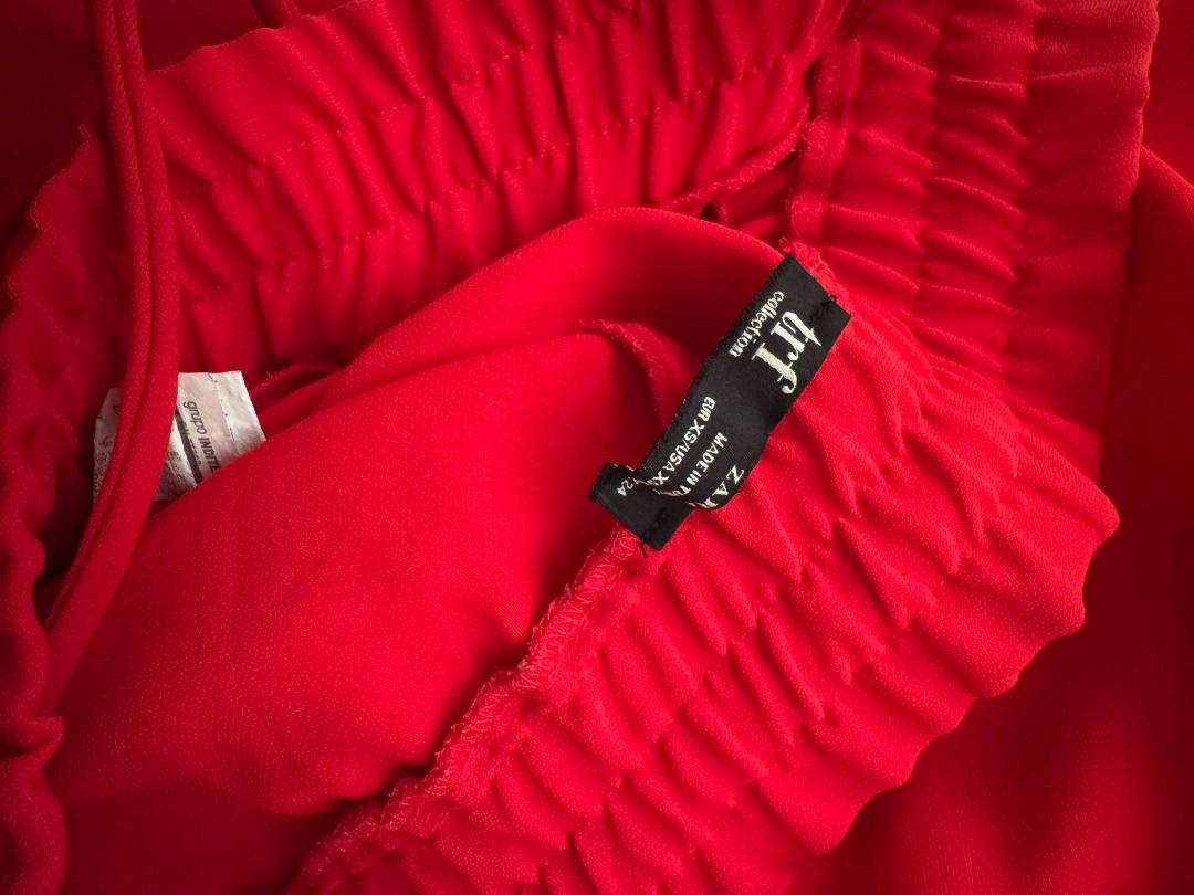 Zara TRF Red Joggers Drawstring Sweatpants Size XS (Category: Joggers) located in Cebu City. Submitted by _t.rix (Listing ID 1470382596, Image 3). Description: - Brand: Zara TRF - Size: Extra Small (XS) - Color: Bright Red - Fit: High waist with adjustable drawstring and comfortable elasticated ankle cuffs - Material: Soft and cozy fabric - Best for: Casual outfits, running errands, or lounging at home.