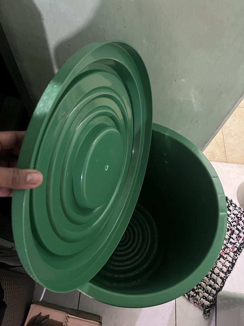 Water Container / Zooey 70 L Green Storage Bin (Category: Storage Boxes & Baskets) located in Manila. Submitted by eddiebenta26 (Listing ID 1470412767, Image 2). Description: - Brand: Zooey - Capacity: 70 Liters / 22 Gallons - Color: Green body with bright yellow side handles - Includes matching lid with central handle - Durable ribbed body and sturdy construction - Ideal for home, garage, or outdoor organization - Condition: Brand new / Excellen