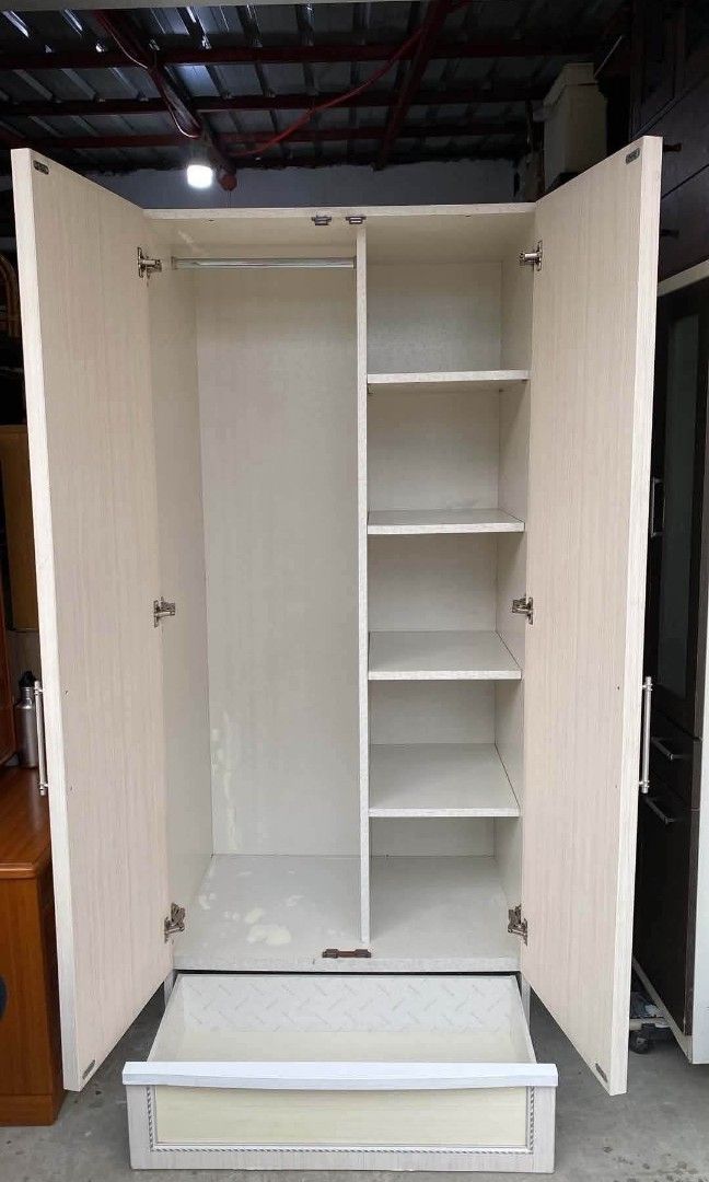 2 Door Wardrobe Closet Cabinet with Bottom Drawer (Category: Shelves, Cabinets & Racks) located in Quezon City. Submitted by dannikkishoppe2 (Listing ID 1470650585, Image 3). Description: 2 Door Wardrobe Closet Cabinet with Bottom Drawer‼️₱8500‼️ L36 W25 H82 inches *adjustable shelves Please manage your expectations as there might be minimal flaws. Color may vary due to lighting, it may appear darker or lighter in person. Check photos first befor