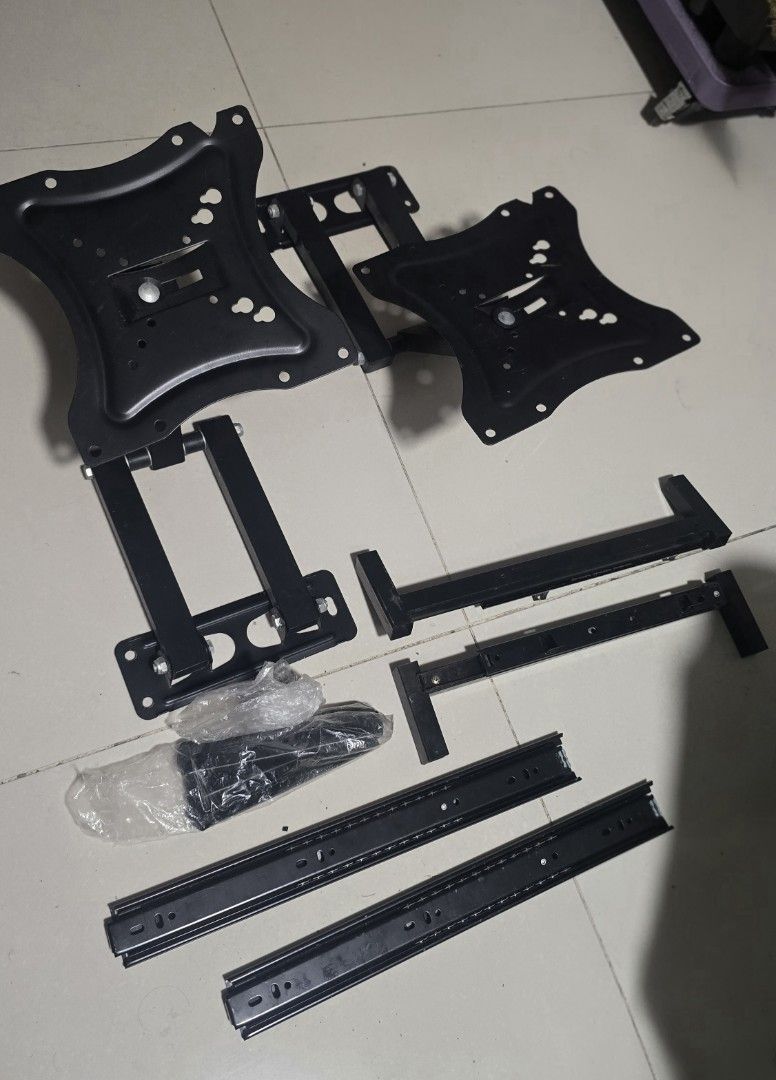 2pcs Heavy Duty Adjustable TV Wall Mount Bracket (Category: TV Parts & Accessories) located in Caloocan City. Submitted by marces (Listing ID 1470688766, Image 1). Description: - Sturdy black metal construction for flat screen monitor - Full-motion dual arms for flexible viewing angles - Includes VESA mounting plates and extension rails - used for my 24inch monitor * freebie* drawer rail .