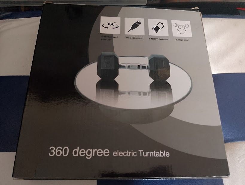 360 Degree Electric Turntable Rotating Display Stand (Category: Portable Music Players) located in Quezon City. Submitted by susmaryosep1 (Listing ID 1470669791, Image 1). Description: 360-degree electric rotating display stand. Great for product photography, collectibles, and showcasing items smoothly. Operates via USB power or batteries. Features bidirectional rotation and mirror-like reflective surface on top. Issue: may Issue. di na nag u-u t