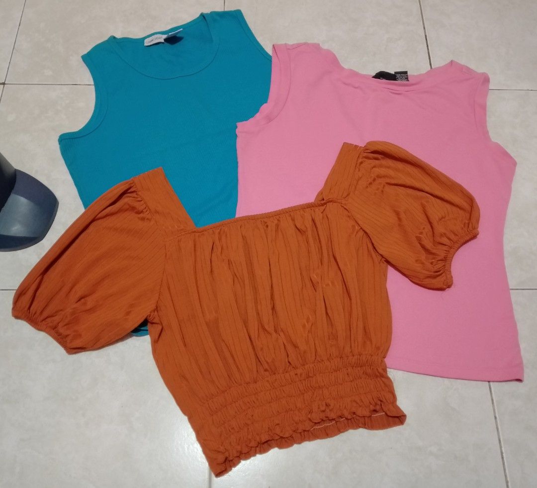(3 FOR 75) TANK TOPS (Category: Sleeveless) located in Manila. Submitted by nievesolanna (Listing ID 1470730361, Image 1). Description: size large on tag. 2 branded tops. makapal at presko ang fabric. stretchable yung isa since smacking yung sa ilalim na part. sold as set only. 75 PESOS LOC: SAMPALOC, MANILA .