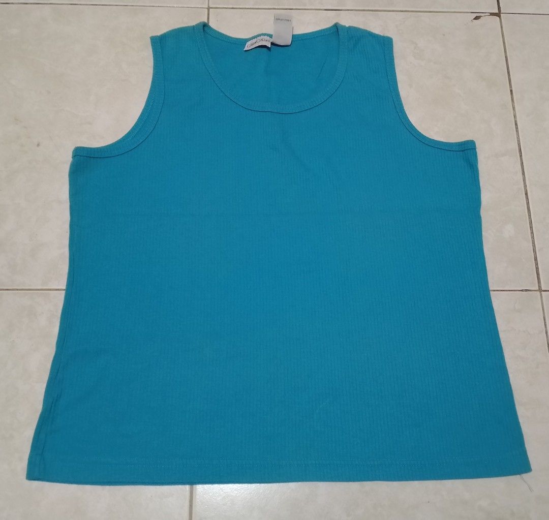 (3 FOR 75) TANK TOPS (Category: Sleeveless) located in Manila. Submitted by nievesolanna (Listing ID 1470730361, Image 3). Description: size large on tag. 2 branded tops. makapal at presko ang fabric. stretchable yung isa since smacking yung sa ilalim na part. sold as set only. 75 PESOS LOC: SAMPALOC, MANILA .