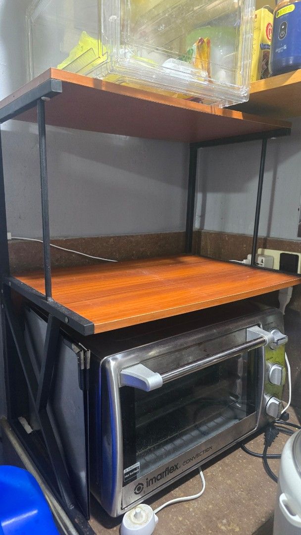 3-Tier Kitchen Microwave Oven Storage Rack Shelf (Category: Shelves, Cabinets & Racks) located in Caloocan City. Submitted by marces (Listing ID 1470606861, Image 2). Description: - Multi-tier kitchen rack for appliances and storage - Strong metal frame with durable wooden shelves - Perfect fit for microwave ovens, rice cookers, and toaster ovens - Saves counter space and keeps your kitchen organized - Quick and easy to assemble.