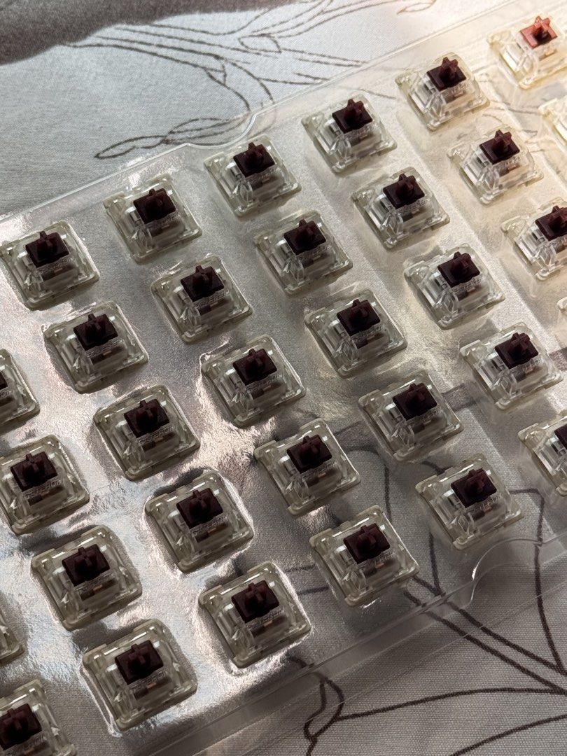45pcs Gateron Brown Mechanical Keyboard Switches (untested) (Category: Computer Keyboard) located in Manila. Submitted by delapazrdee (Listing ID 1470638636, Image 2). Description: - Switch Type: Gateron Brown Tactile 45pcs - Compatibility: Standard MX-style stems, fits soldering and hot-swap boards - Condition: Untested as of posting, no bent pins - Packaging: will include case and box meetups near sm san lazaro grab/lalamove c/o buyer.