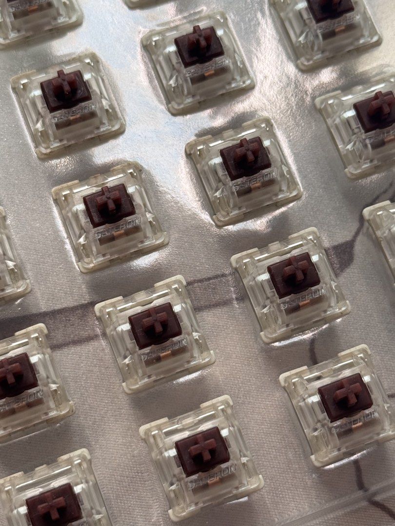 45pcs Gateron Brown Mechanical Keyboard Switches (untested) (Category: Computer Keyboard) located in Manila. Submitted by delapazrdee (Listing ID 1470638636, Image 1). Description: - Switch Type: Gateron Brown Tactile 45pcs - Compatibility: Standard MX-style stems, fits soldering and hot-swap boards - Condition: Untested as of posting, no bent pins - Packaging: will include case and box meetups near sm san lazaro grab/lalamove c/o buyer.