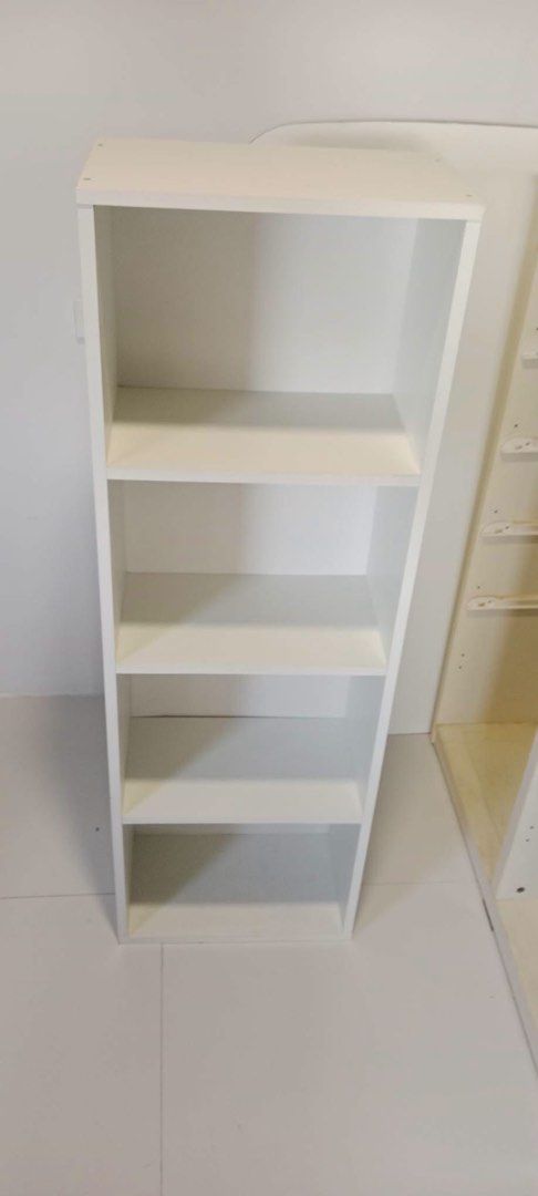 4 Layer white rack (Category: Shelves, Cabinets & Racks) located in Malabon City. Submitted by aven25 (Listing ID 1470631689, Image 1). Description: 4 Layer white rack Size: 16 x 9.5 x 48 inches Height No issue .