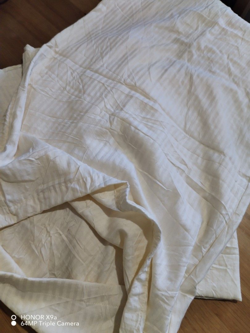 5 Pcs Pillow case ( Standard Size) (Category: Bedding & Towels) located in Muntinlupa City. Submitted by arciagamaryann68 (Listing ID 1470621633, Image 2). Description: - Set includes 5 pieces of standard size pillow cases - Features a subtle and elegant stripe design - Neutral cream/off-white color that matches any bedroom interior - Soft fabric material, comfortable for daily sleeping.