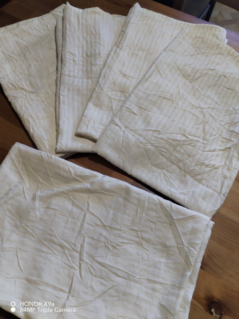 5 Pcs Pillow case ( Standard Size) (Category: Bedding & Towels) located in Muntinlupa City. Submitted by arciagamaryann68 (Listing ID 1470621633, Image 3). Description: - Set includes 5 pieces of standard size pillow cases - Features a subtle and elegant stripe design - Neutral cream/off-white color that matches any bedroom interior - Soft fabric material, comfortable for daily sleeping.