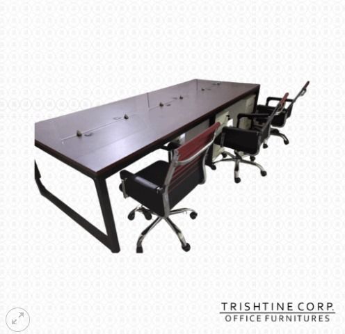 6-Seater Customized Workstation with Glass Panel Divider (Category: Tables & Sets) located in Caloocan City. Submitted by jim.trishtineofficefurnitures (Listing ID 1470602396, Image 2). Description: - Large office workstation with dark wood finish and sturdy black metal frame - Features a central glass divider for privacy and separate workspace zones - Includes 6 matching ergonomic mesh office chairs with striking red backs and black seats - Gene
