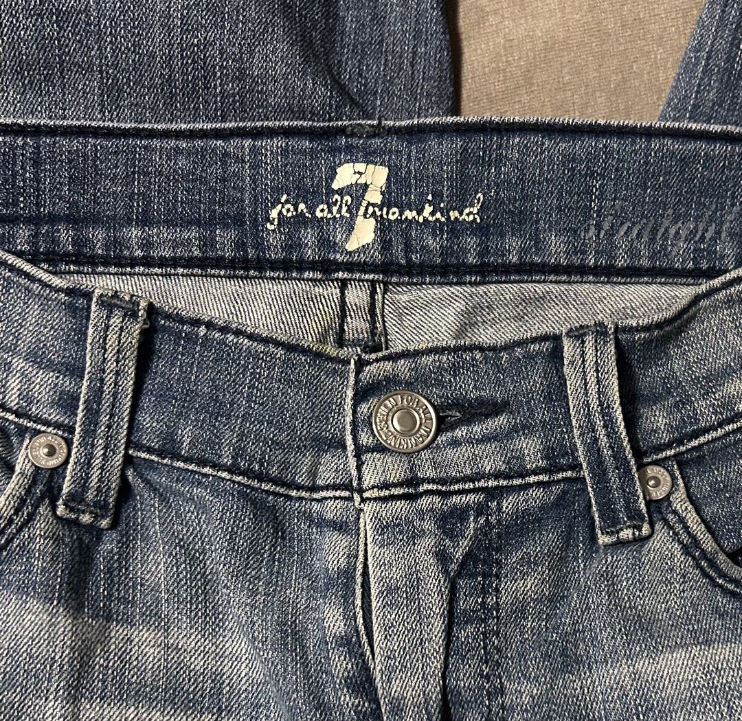 7 FOR ALL MANKIND (Category: Jeans) located in Davao. Submitted by sart0ria85 (Listing ID 1470681120, Image 3). Description: 7 For All Mankind distressed straight leg jeans in a medium blue wash. Size 25. Classic button fly closure with branded hardware. Subtle whiskering across the front hips. Small intentional distressing detail near the left knee. Straight cut silhouette. 98%COTTON 2%ELASTANE MADE IN MEXICO 🇲🇽 SMALL. Size 3-4 VERY GOOD CONDI