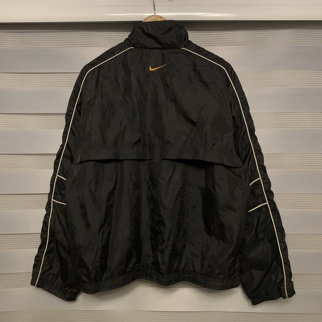 90's NIKE WIND BREAKER JACKET (Category: Coats, Jackets and Outerwear) located in Butuan. Submitted by 8600_recycled.hyp3 (Listing ID 1470696636, Image 2). Description: L on tag 24W x 26L (boxy) Missing puller but zipper still working Needs wash.