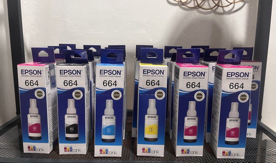 💯 Authentic Epson 664 Ink (Category: Printers, Scanners & Copiers) located in Quezon City. Submitted by littleparties (Listing ID 1470627152, Image 1). Description: - 100% genuine Epson EcoTank 664 ink bottles - Available colors: Black, Cyan, Magenta, and Yellow - Factory-sealed and unopened in original boxes - you can scan the QR code to see proof of authenticity - php300 each or php1000 per set.