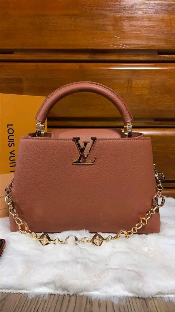 🖤 Louis Vuitton Taurillon Capucines BB Tan (Category: Luxury Accessories) located in Caloocan City. Submitted by mohsin2 (Listing ID 1470623106, Image 3). Description: Louis Vuitton Taurillon Capucines BB Tan 18,980p pkus sf Like new/Brandnew Colour Tan Taurillon leather Cowhide-leather trim Cowhide-leather lining Resin and gold-toned hardware Double-carry style: flap inside or outside Compartmented interior with 1 zipped pocket and 2 flat pocke