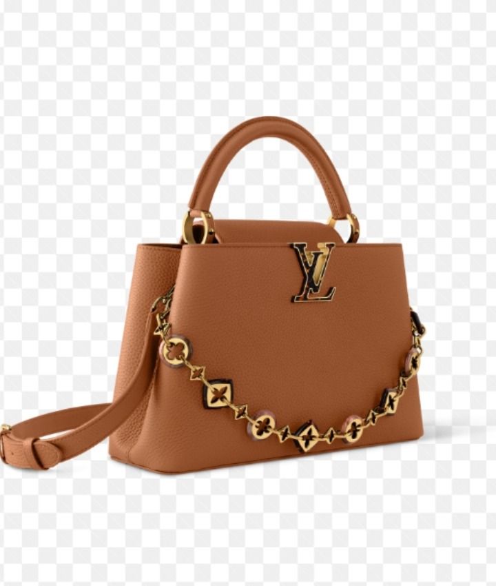 💢 Louis Vuitton Taurillon Leather Capucines BB Tan (Category: Luxury Accessories) located in Kibawe. Submitted by yumicaspia39544 (Listing ID 1470624836, Image 1). Description: Louis Vuitton Taurillon Leather Capucines BB Tan 18,999p pkus sf Like new/Brandnew Colour Tan Taurillon leather Cowhide-leather trim Cowhide-leather lining Resin and gold-toned hardware Double-carry style: flap inside or outside Compartmented interior with 1 zipped pocket