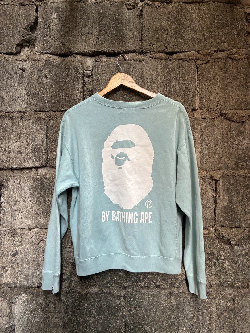 A Bathing Ape BAPE Mint Green Crewneck Sweatshirt (Category: Coats, Jackets and Outerwear) located in Manila. Submitted by assortedgoodsv3 (Listing ID 1470620209, Image 1). Description: - Authentic BAPE crewneck in mint green - Size: Small - Heavyweight cotton fleece material for a comfortable fit - Small embroidered logo on the chest - Large A Bathing Ape graphic hit printed on the back - Ribbed collar with a triangle insert - Classic ape head t